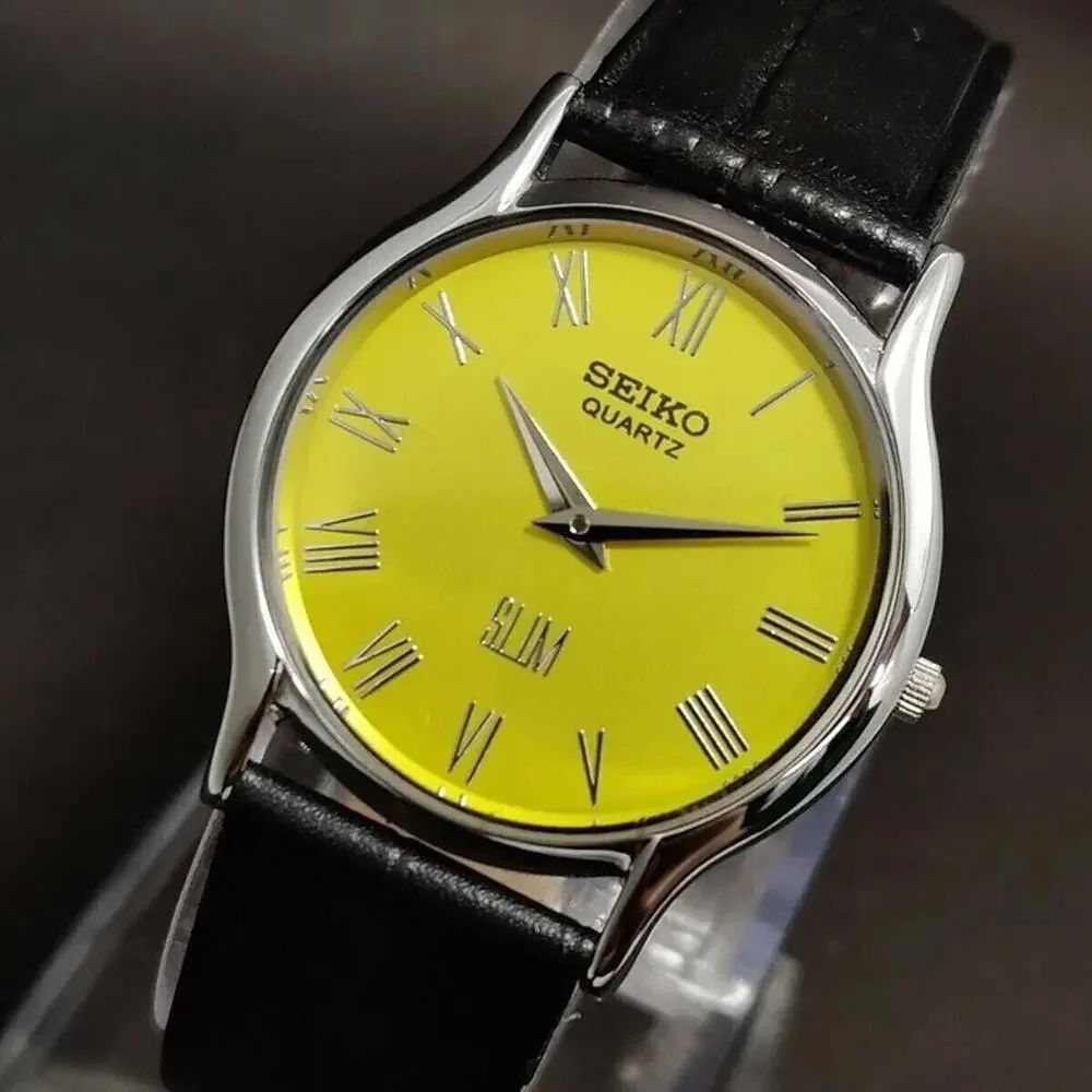 Vintage Style Seiko Quartz Mens Silver Watch & Yellow accents W/ Metal Strap